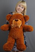 Красивая коричневая мягкая игрушка